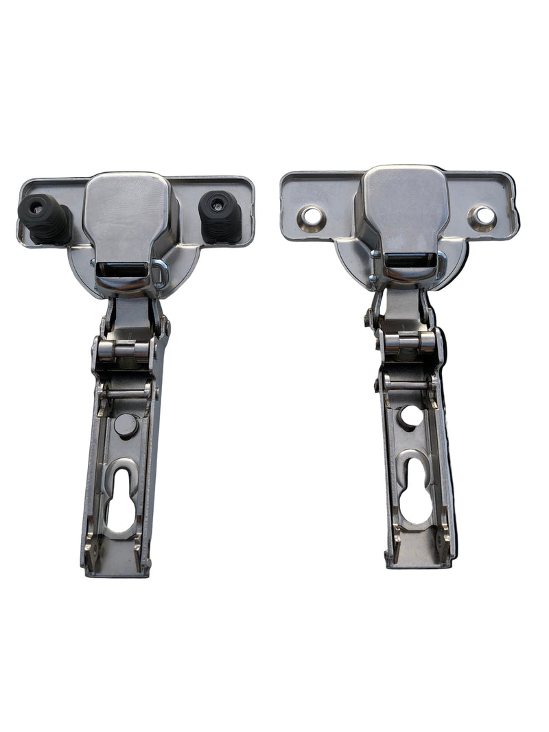 Load image into Gallery viewer, Two cabinet hinges with attached screws and dowels on a clear surface.
